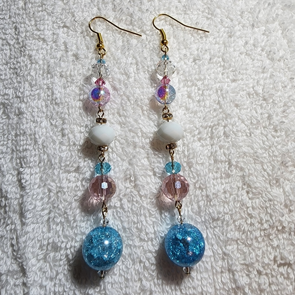 Long dangle earrings with blue crackle glass.